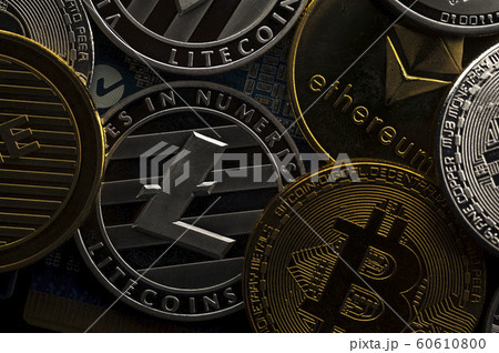 Close-up of Bitcoin coins lie on each other Close-up of Bitcoin coins lie on each other 60610800