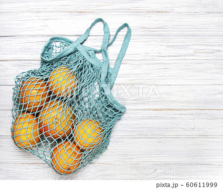 Mesh shopping bag with oranges Mesh shopping bag with oranges 60611999