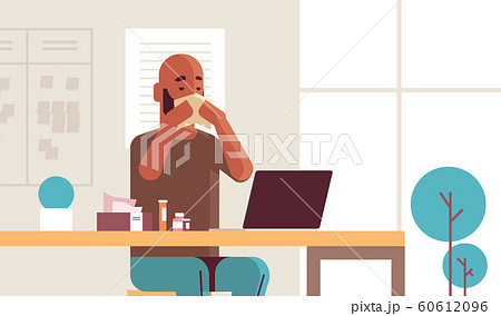 sick businessman blowing nose with handkerchief african american guy sitting at workplace using laptop man having flu sneeze illness concept modern office interior portrait horizontal sick businessman blowing nose with handkerchief african american guy sitting at workplace using laptop man having flu sneeze illness concept modern office interior portrait horizontal 60612096