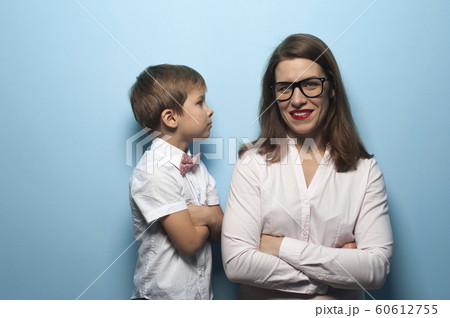 Charming little boy looks at his pretty mom Charming little boy looks at his pretty mom 60612755