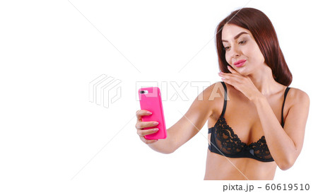 Pretty woman with mobile phone in hands. Pretty woman with mobile phone in hands. 60619510