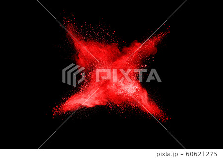 abstract red powder explosion on black background.abstract red powder splatted on black background. Freeze motion of red powder exploding. 60621275