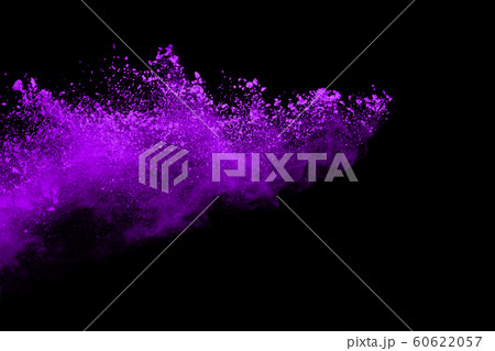 The movement of abstract dust explosion frozen purple on black background. Stop the movement of powdered purple on black background. Explosive powder purple on black background. 60622057