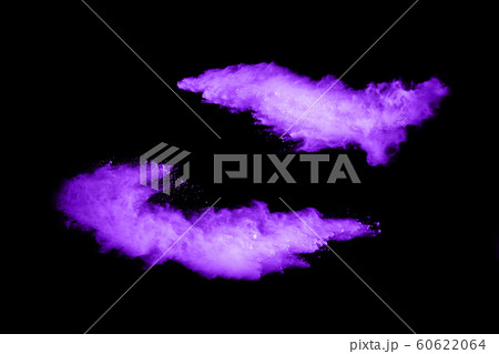 The movement of abstract dust explosion frozen purple on black background. Stop the movement of powdered purple on black background. Explosive powder purple on black background. The movement of abstract dust explosion frozen purple on black background. Stop the movement of powdered purple on black background. Explosive powder purple on black background. 60622064