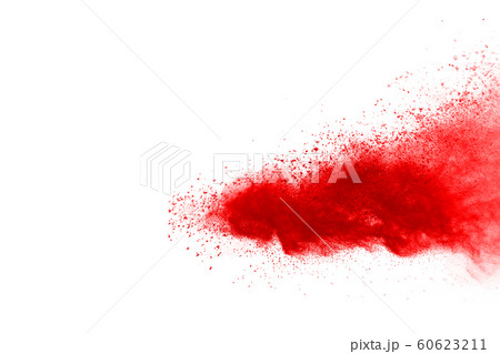 Freeze motion of red powder exploding, isolated on white background. Abstract design of red dust cloud. Particles explosion screen saver, wallpaper Freeze motion of red powder exploding, isolated on white background. Abstract design of red dust cloud. Particles explosion screen saver, wallpaper 60623211