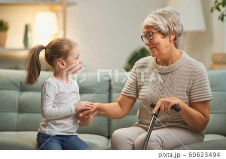 girl and her grandmother girl and her grandmother 60623494