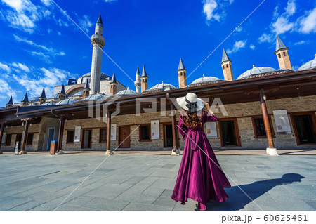 Beautiful girl walking at mosque in Konya, Turkey. 60625461