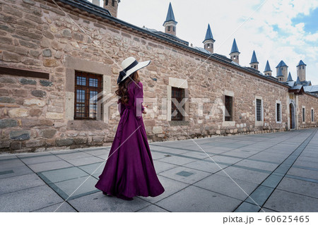 Beautiful girl walking at mosque in Konya, Turkey. 60625465
