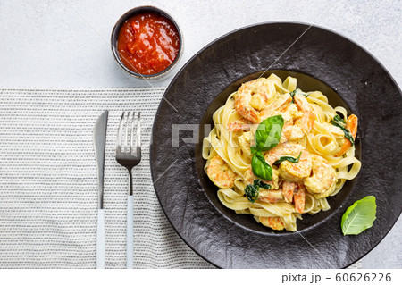 pasta in a creamy sauce with shrimp pasta in a creamy sauce with shrimp 60626226