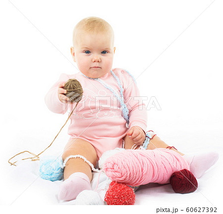 girl with colored thread 60627392