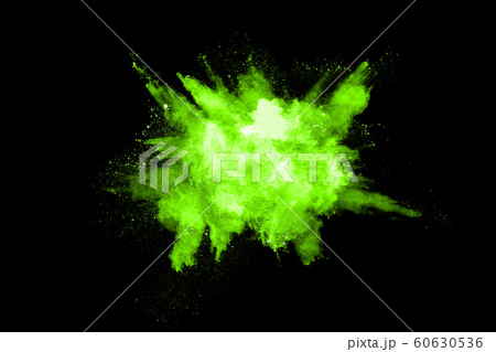 The movement of abstract dust explosion frozen green on black background. Stop the movement of powdered green on black background. Explosive powder green on black background. The movement of abstract dust explosion frozen green on black background. Stop the movement of powdered green on black background. Explosive powder green on black background. 60630536