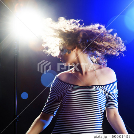 young woman dancing young woman dancing 60631435