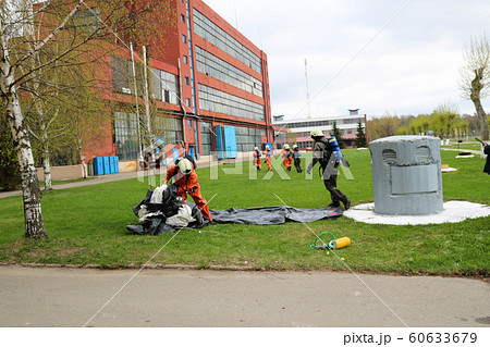 Professional firefighters, rescuers in  60633679