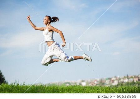 woman engaged in fitness woman engaged in fitness 60633869
