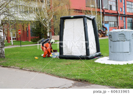 A professional firefighter in an orange special A professional firefighter in an orange special 60633965