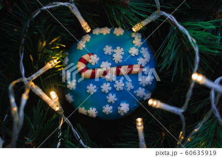 Christmas cakes on the table with tangerines Christmas cakes on the table with tangerines 60635919