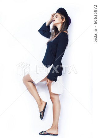 young pretty blond girl hipster in hat posing smiling happy isolated on white background, lifestyle people concept 60635972