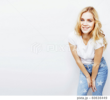 young pretty stylish hipster blond girl posing emotional isolated on white background happy smiling cool smile, lifestyle people concept young pretty stylish hipster blond girl posing emotional isolated on white background happy smiling cool smile, lifestyle people concept 60636449