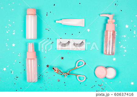 Care cosmetics on a trendy green background. Care cosmetics on a trendy green background. 60637416