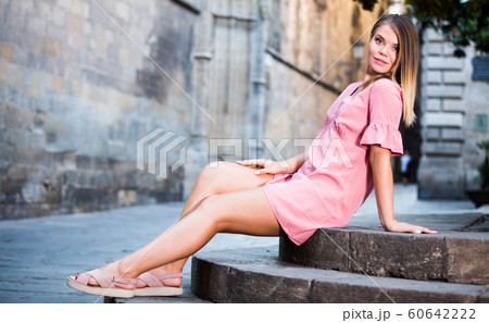 Woman resting during walk 60642222