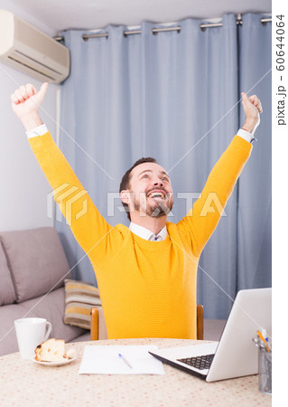 Smiling man communicate by video 60644064