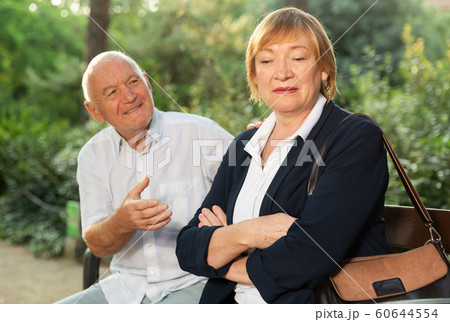Elderly woman offended by her husband 60644554