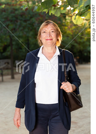 Woman posing in green park 60644997