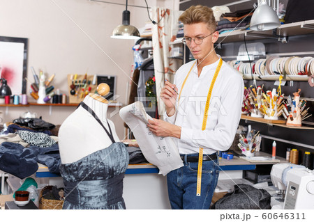 Dressmaker at work – creating dress style Dressmaker at work – creating dress style 60646311