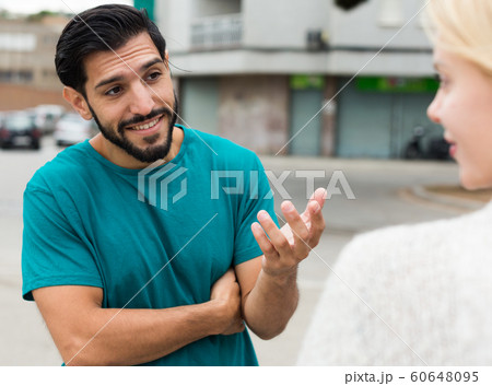 Man is acquaintancing with young woman Man is acquaintancing with young woman 60648095