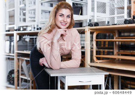 Portrait of woman in store 60648449