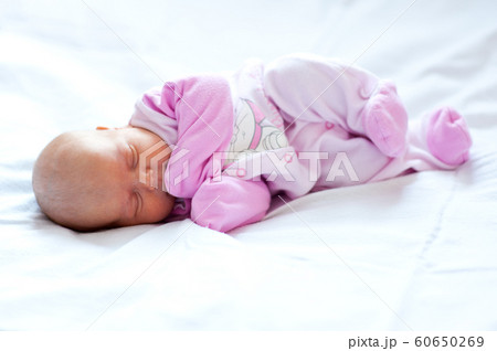 Baby girl sleeping Baby girl sleeping 60650269