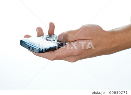 Cell phone in a hand Cell phone in a hand 60650271