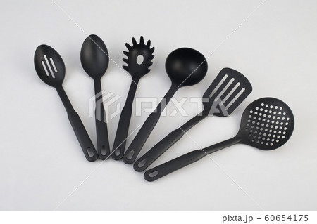 group of black plastic kitchen utensils isolated group of black plastic kitchen utensils isolated 60654175