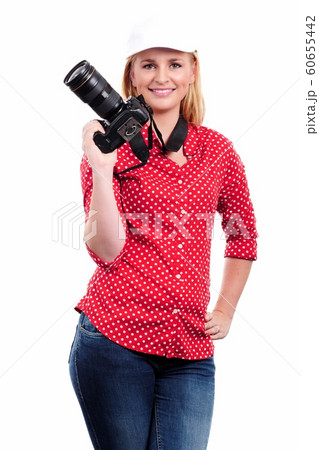 pretty blonde woman photographer with her camera, 60655442