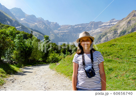 young hiker and cirque de Gavarnie in the French 60656740