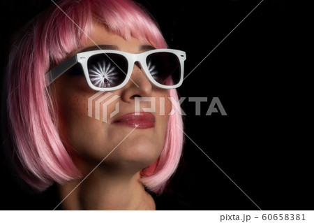 Portrait of girl with studio lights on umbrella 60658381