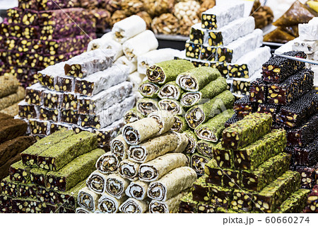 Background sweets baklava turkish delight nuts in the oriental market. 60660274