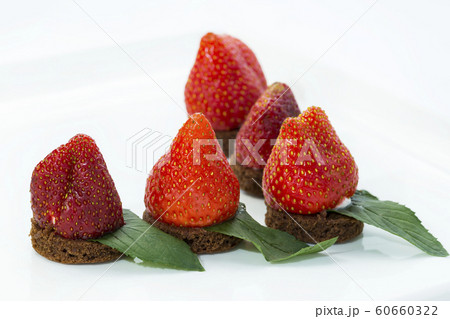 Mini snacks for buffet and banquet in a plastic bowl on a white background. 60660322