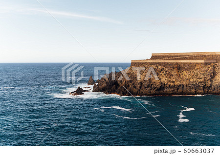 Breaking waves on the coast of Tenerife island, Canary islands, Atlantic ocean, Spain 60663037