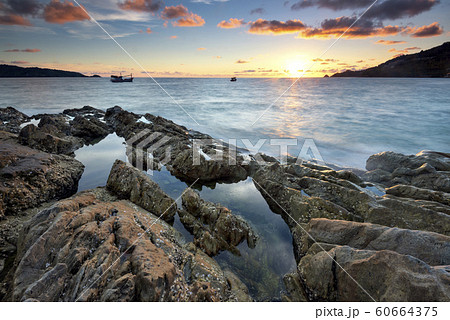 Sunset at Kalim Beach, Phuket, Thailand Sunset at Kalim Beach, Phuket, Thailand 60664375