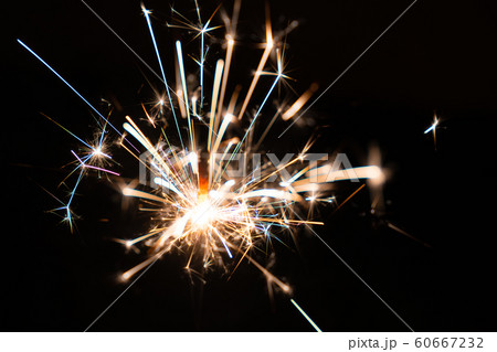 Burning sparkler 60667232