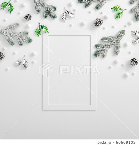 Evergreen tree branch with snow and pine cones Evergreen tree branch with snow and pine cones 60669105