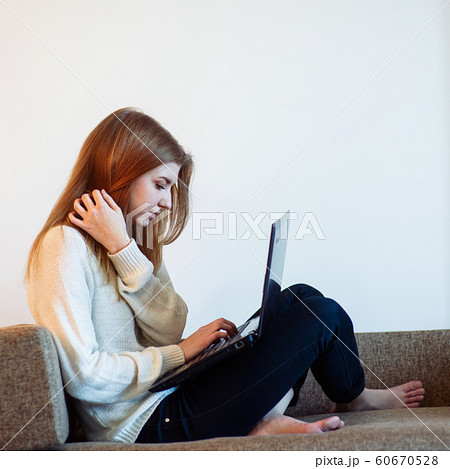 woman on the sofa woman on the sofa 60670528