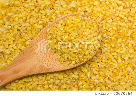 Cornflakes on a wooden spoon.Organic healthy vegetarian food. Cornflakes on a wooden spoon.Organic healthy vegetarian food. 60670564