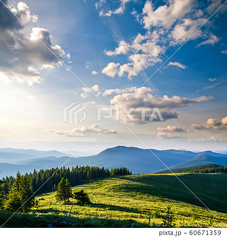 View of misty fog mountains in autumn 60671359