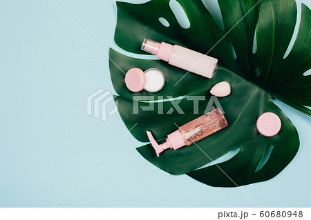 Care cosmetics on green background Care cosmetics on green background 60680948