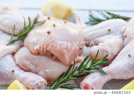 fresh raw chicken with rosemary lemon herbs and 60681503