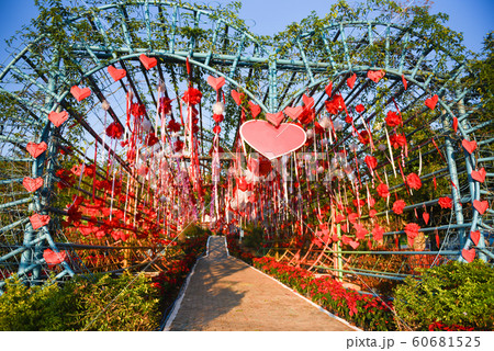 Red heart paper cut and ribbon hanging on the love Red heart paper cut and ribbon hanging on the love 60681525