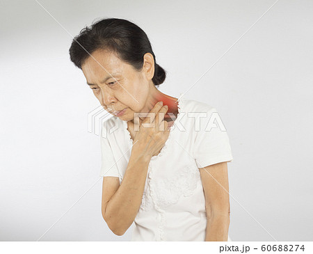 old asian woman feel neck muscle pain	 60688274