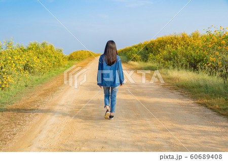 Portrait of happy Asian woman enjoying and Portrait of happy Asian woman enjoying and 60689408